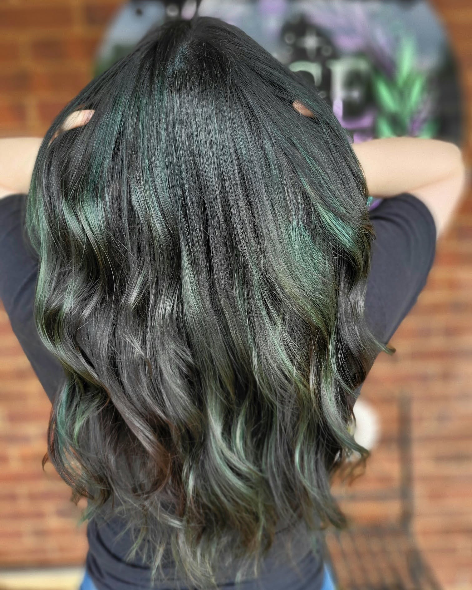 Glossy dark waves with emerald green dimensional color styled by Sienne Coonts